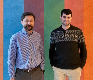 two men posing for a photo